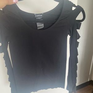 Black Bebe long sleeve shirt with arm slits, size S